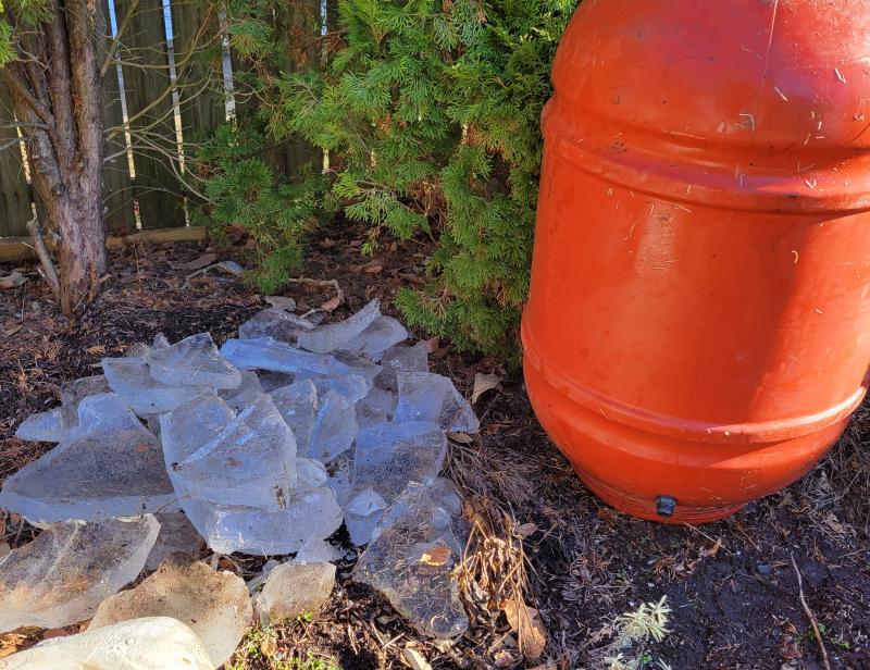 From an Arctic cold front to unseasonably warm temperatures, the weather around here has been a wild ride recently. This photo was taken Dec. 30. The pile of ice is from the water in the rain barrel to the right. It had been well above freezing for days, but the ice was still there from when it was numbingly cold before Christmas. CHRIS FLOOD PHOTOS
